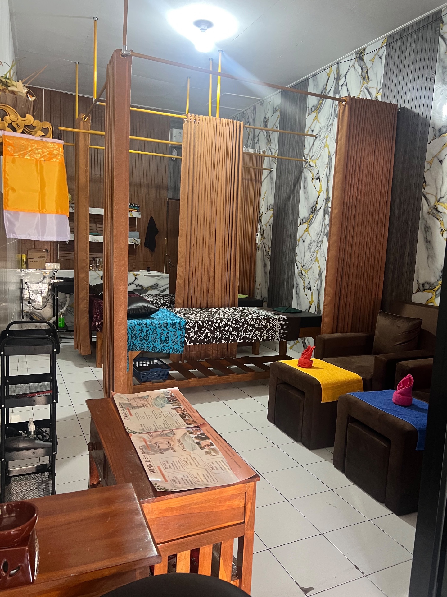 Balinese spa treatment room with tropical plants at Winnie Spa & Salon